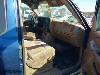 1999 Chevrolet Silverado 1500 LS with VIN 2GCEC19V1X1144026, listed as a IAAI auction lot 41398552 with 216,068 mi miles. Bid and sale history available at carsss.com. Image 5.
