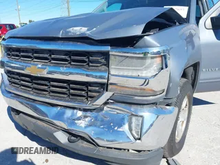 2016 Chevrolet Silverado 1500 LT with VIN 3GCUKREC8GG219524, listed as a IAAI auction lot 41087657 with 123,010 mi miles and . Bid and sale history available at DreamBid. Image 6.