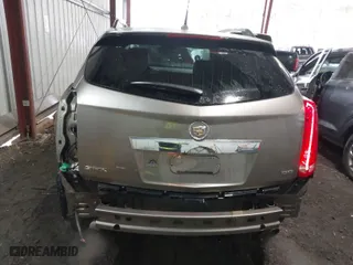 2012 Cadillac SRX Luxury Collection with VIN 3GYFNAE39CS576164, listed as a IAAI auction lot 42021613 with 153,262 mi miles. Bid and sale history available at carsss.com. Image 17.