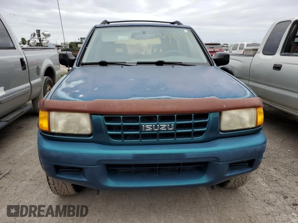 1999 Isuzu Rodeo S with VIN 4S2CK58W9X4322074, listed as a Copart auction lot 76999244 with 110,142 mi miles and Salvage Title. Bid and sale history available at carsss.com. Image 5.
