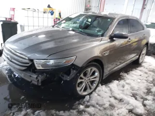 2013 Ford Taurus SEL z VIN 1FAHP2E89DG150197, wystawiony jako IAAI lot #41214999 z przebiegiem 146 307 mil mil oraz . Historia ofert i sprzedaży dostępna na DreamBid. Obrazek 2.