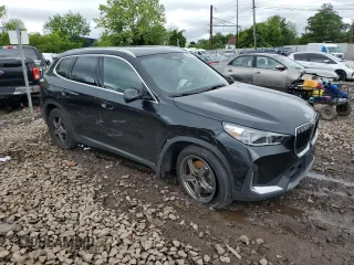 2023 BMW X1 xDrive28i with VIN WBX73EF03P5W45445, listed as a Copart auction lot 58377635 with 47,249 mi miles and Salvage title. Bid and sale history available at DreamBid. Image 4.