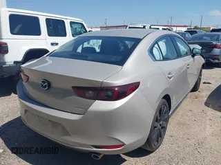 2025 Mazda 3 S Select Sport with VIN JM1BPABMXS1775333, listed as a IAAI auction lot 42053491 with 2,457 mi miles and . Bid and sale history available at DreamBid. Image 4.