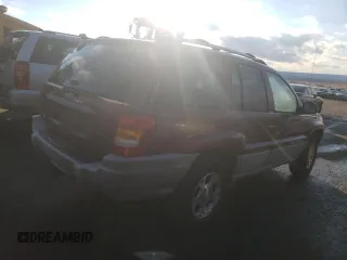 1999 Jeep Grand Cherokee Laredo with VIN 1J4GW58SXXC706962, listed as a Copart auction lot 88325515 with Not provided miles and Clean title. Bid and sale history available at DreamBid. Image 3.