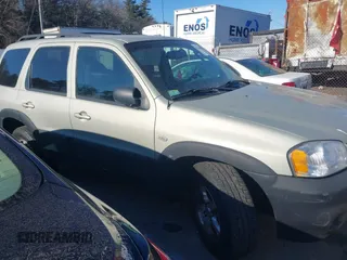 2006 Mazda Tribute i with VIN 4F2YZ92Z66KM10050, listed as a IAAI auction lot 41346153 with 139,668 mi miles and . Bid and sale history available at carsss.com. Image 13.
