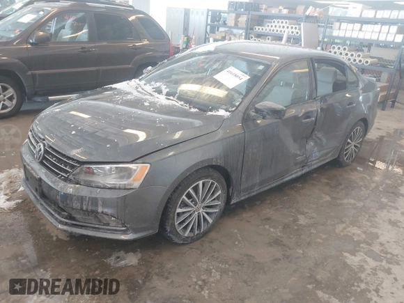 2016 Volkswagen Jetta Sport z VIN 3VWD17AJ9GM250243, wystawiony jako IAAI lot #41618054 z przebiegiem 38 520 mil mil oraz . Historia ofert i sprzedaży dostępna na DreamBid. Obrazek 18.
