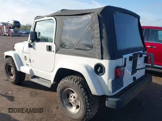2002 Jeep Wrangler Sahara with VIN 1J4FA59S62P772256, listed as a IAAI auction lot 41968844 with 170,218 mi miles. Bid and sale history available at carsss.com. Image 3.