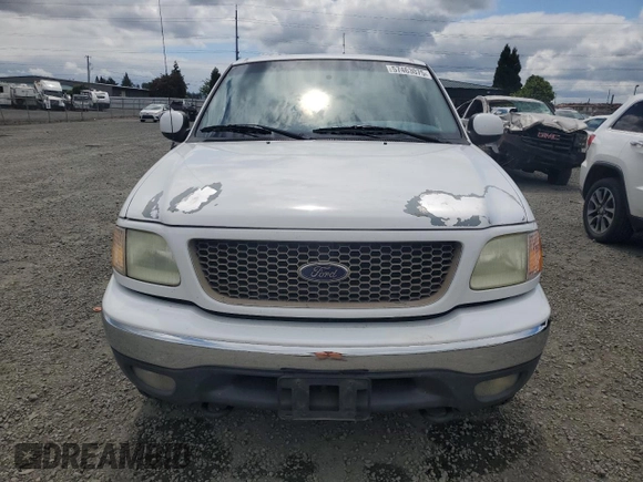 2002 Ford F-150 XL with VIN 1FTRX18L62KC53807, listed as a Copart auction lot 57463075 with 173,301 mi miles and Salvage title. Bid and sale history available at DreamBid. Image 5.