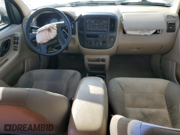 2004 Ford Escape XLS with VIN 1FMYU021X4KA41111, listed as a Copart auction lot 45393765 with 125,492 mi miles and Salvage Title. Bid and sale history available at DreamBid. Image 8.