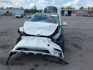 2021 Tesla Model Y Long Range z VIN 5YJYGDEE2MF200315, wystawiony jako IAAI lot #42233599 z przebiegiem 38 742 mil mil oraz . Historia ofert i sprzedaży dostępna na DreamBid. Obrazek 11.