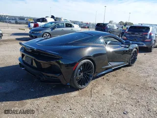 2020 McLaren GT with VIN SBM22GCA1LW000498, listed as a IAAI auction lot 41265247 with 18,465 mi miles. Bid and sale history available at carsss.com. Image 4.