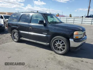 2004 GMC Yukon SLE with VIN 1GKEC13V44R263849, listed as a Copart auction lot 47528325 with 448,294 mi miles and Salvage Title. Bid and sale history available at carsss.com. Image 4.