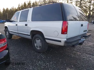 1997 Chevrolet Suburban with VIN 3GNFK16RXVG102805, listed as a IAAI auction lot 41559415 with 1 mi miles. Bid and sale history available at carsss.com. Image 3.