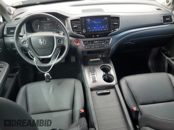 2023 Honda Ridgeline RTL-E with VIN 5FPYK3F70PB018858, listed as a Copart auction lot 64210205 with 16,562 mi miles and Salvage title. Bid and sale history available at DreamBid. Image 8.