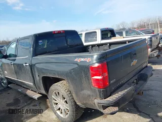 2015 Chevrolet Silverado 1500 High Country with VIN 3GCUKTEC7FG123735, listed as a IAAI auction lot 41769439 with 183,183 mi miles and . Bid and sale history available at DreamBid. Image 3.