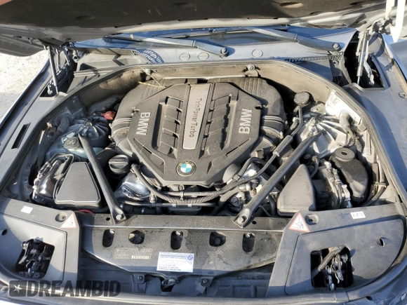 2013 BMW 5 Series with VIN WBASP0C59DC987937, listed as a Copart auction lot 84171054 with 115,522 mi miles and Salvage title. Bid and sale history available at DreamBid. Image 12.