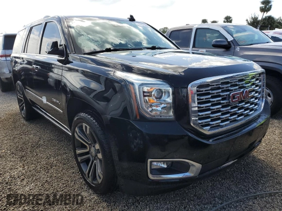 2020 GMC Yukon Denali with VIN 1GKS1CKJXLR181612, listed as a Copart auction lot 74451364 with 52,761 mi miles and Salvage Title. Bid and sale history available at carsss.com. Image 4.