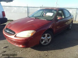 2001 Ford Taurus SES with VIN 1FAFP55U41A281039, listed as a IAAI auction lot 41676971 with 139,866 mi miles. Bid and sale history available at carsss.com. Image 2.