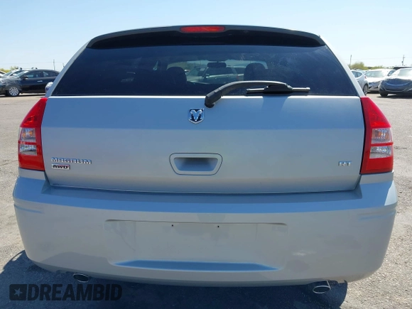 2005 Dodge Magnum z VIN 2D8GZ58235H576127, wystawiony jako IAAI lot #41989680 z przebiegiem 136 488 mil mil oraz . Historia ofert i sprzedaży dostępna na DreamBid. Obrazek 17.
