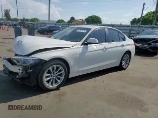 2018 BMW 3 Series 320i xDrive with VIN WBA8A3C55JA357532, listed as a Copart auction lot 57561015 with 46,876 mi miles and Salvage title. Bid and sale history available at DreamBid. Image 13.