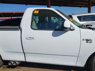 1999 Ford F-150 Work Series with VIN 1FTRF17W0XKA35108, listed as a IAAI auction lot 41383313 with 1 mi miles. Bid and sale history available at carsss.com. Image 13.
