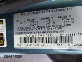 2010 Mazda Mazda3 i Touring with VIN JM1BL1SG5A1164355, listed as a IAAI auction lot 42044865 with 127,809 mi miles. Bid and sale history available at carsss.com. Image 9.