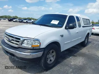 2003 Ford F-150 XL with VIN 1FTRX17W53NA40472, listed as a IAAI auction lot 42491035 with Not provided miles and . Bid and sale history available at DreamBid. Image 6.