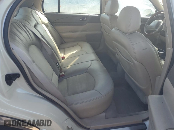 2002 Lincoln Continental with VIN 1LNHM97V32Y694132, listed as a Copart auction lot 76410144 with 0 mi miles and Non Repairable. Bid and sale history available at carsss.com. Image 10.