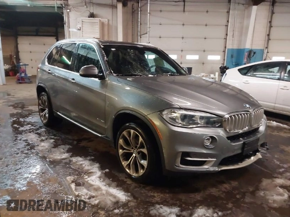 2018 BMW X5 xDrive35i with VIN 5UXKR0C53J0Y03214, listed as a IAAI auction lot 41509082 with 92,552 mi miles. Bid and sale history available at carsss.com. Image 1.