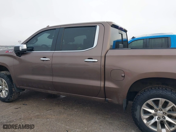 2019 Chevrolet Silverado 1500 LTZ with VIN 3GCUYGEL9KG228891, listed as a IAAI auction lot 41053828 with 61,684 mi miles. Bid and sale history available at carsss.com. Image 14.