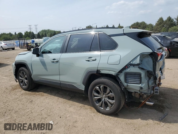 2022 Toyota RAV4 Hybrid XLE Premium with VIN 4T3B6RFV8NU101319, listed as a Copart auction lot 60987535 with 100,070 mi miles and Salvage title. Bid and sale history available at DreamBid. Image 2.