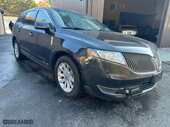 2015 Lincoln MKT with VIN 2LMHJ5NK0FBL03293, listed as a Copart auction lot 42715595 with 115,725 mi miles and Clean Title. Bid and sale history available at carsss.com. Image 1.