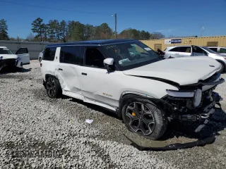 2024 Rivian R1S Adventure z VIN 7PDSGABA7RN034025, wystawiony jako Copart lot #49332795 z przebiegiem Nie podano mil oraz Szkody całkowita. Historia ofert i sprzedaży dostępna na DreamBid. Obrazek 4.