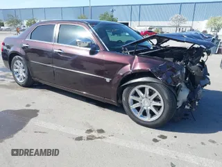 2005 Chrysler 300 with VIN 2C3JA63H25H102333, listed as a IAAI auction lot 41967876 with 125,092 mi miles. Bid and sale history available at carsss.com. Image 1.