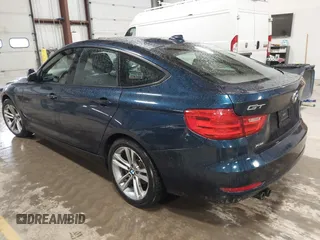 2014 BMW 3 Series 328i Gran Turismo xDrive with VIN WBA3X5C5XED557668, listed as a IAAI auction lot 41728522 with 123,393 mi miles and . Bid and sale history available at DreamBid. Image 3.