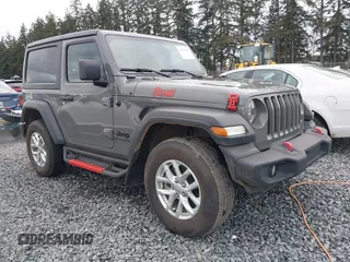 2023 Jeep Wrangler Willys z VIN 1C4HJXAG5PW689027, wystawiony jako IAAI lot #41599591 z przebiegiem 10 792 mil mil oraz . Historia ofert i sprzedaży dostępna na DreamBid. Obrazek 1.