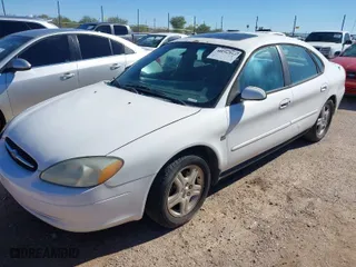 2002 Ford Taurus SEL with VIN 1FAFP56S02A140306, listed as a IAAI auction lot 40696933 with 1 mi miles. Bid and sale history available at carsss.com. Image 2.