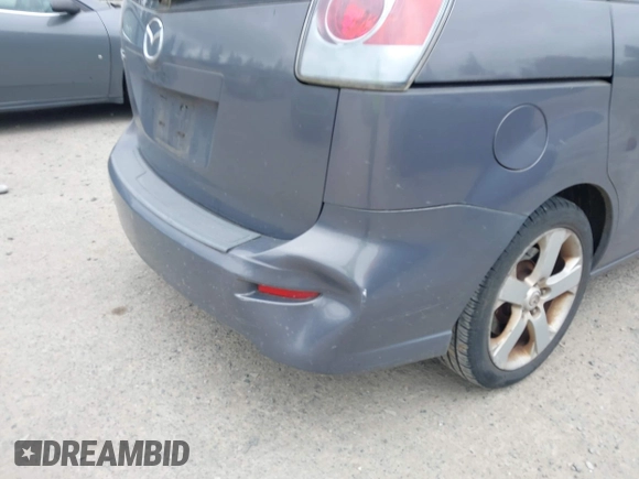 2007 Mazda 5 Touring with VIN JM1CR293570137215, listed as a IAAI auction lot 42497432 with 135,025 mi miles and . Bid and sale history available at DreamBid. Image 13.