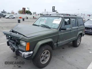 1996 Jeep Cherokee Sport z VIN 1J4FT68S6TL267408, wystawiony jako IAAI lot #42385629 z przebiegiem 268 753 mil mil oraz . Historia ofert i sprzedaży dostępna na DreamBid. Obrazek 18.