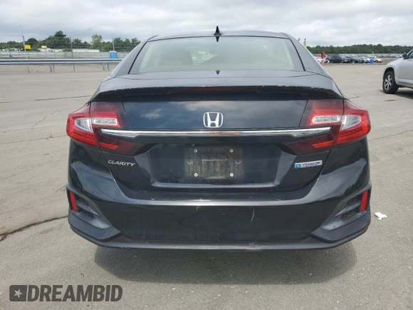 2018 Honda Clarity Plug-In Hybrid with VIN JHMZC5F19JC023089, listed as a Copart auction lot 63196774 with 48,318 mi miles and Salvage Title. Bid and sale history available at carsss.com. Image 6.