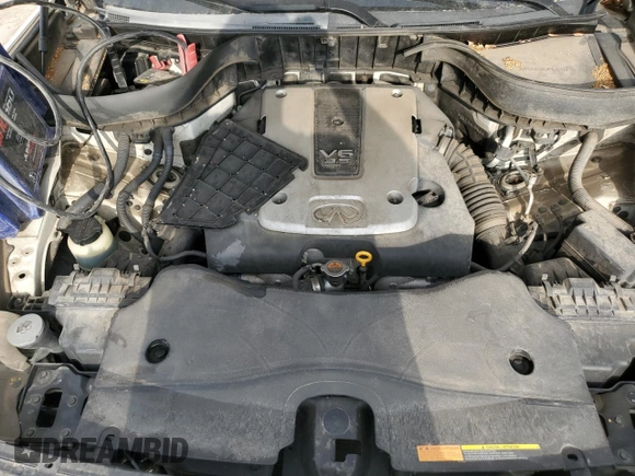 2009 Infiniti FX z VIN JNRAS18W99M157495, wystawiony jako Copart lot #57563365 z przebiegiem 219 597 mil mil oraz Szkoda całkowita • Salvage title. Historia ofert i sprzedaży dostępna na DreamBid. Obrazek 12.