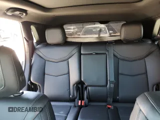 2023 Cadillac XT5 FWD Premium Luxury z VIN 1GYKNCRS0PZ173923, wystawiony jako Copart lot #52212695 z przebiegiem Nie podano mil oraz Szkoda całkowita • Salvage title. Historia ofert i sprzedaży dostępna na DreamBid. Obrazek 10.