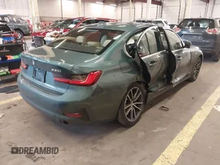 2021 BMW 3 Series 330i xDrive with VIN 3MW5R7J02M8B48226, listed as a IAAI auction lot 41637655 with 33,853 mi miles. Bid and sale history available at carsss.com. Image 4.