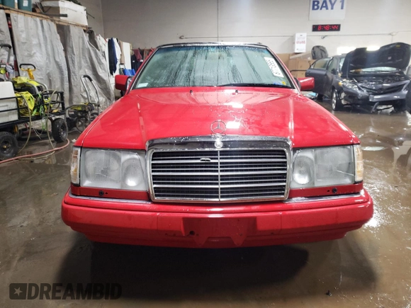 1994 Mercedes-Benz E 320 with VIN WDBEA66E8RC044069, listed as a Copart auction lot 87713565 with 69,061 mi miles and Salvage Title. Bid and sale history available at DreamBid. Image 5.