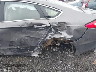 2016 Ford Fusion SE with VIN 3FA6P0H97GR307500, listed as a IAAI auction lot 41836573 with 126,404 mi miles and . Bid and sale history available at carsss.com. Image 6.