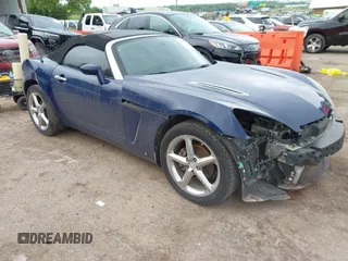 2009 Saturn Sky Red Line z VIN 1G8MT35X09Y105064, wystawiony jako IAAI lot #42197028 z przebiegiem 106 673 mil mil oraz . Historia ofert i sprzedaży dostępna na DreamBid. Obrazek 1.