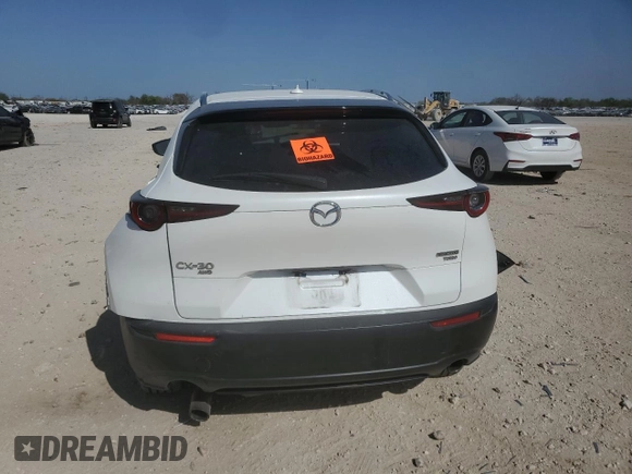 2021 Mazda CX-30 Premium z VIN 3MVDMBDYXMM308490, wystawiony jako Copart lot #49527905 z przebiegiem Nie podano mil oraz Szkoda całkowita • Salvage title. Historia ofert i sprzedaży dostępna na DreamBid. Obrazek 6.