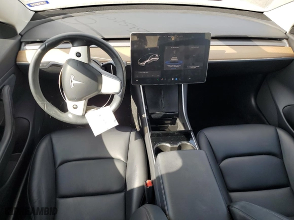 2019 Tesla Model 3 Mid Range with VIN 5YJ3E1EAXKF397050, listed as a Copart auction lot 42102515 with 59,547 mi miles and Salvage Title. Bid and sale history available at carsss.com. Image 8.