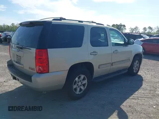 2010 GMC Yukon SLT with VIN 1GKMCCE3XAR225380, listed as a IAAI auction lot 41904723 with 173,686 mi miles. Bid and sale history available at carsss.com. Image 4.