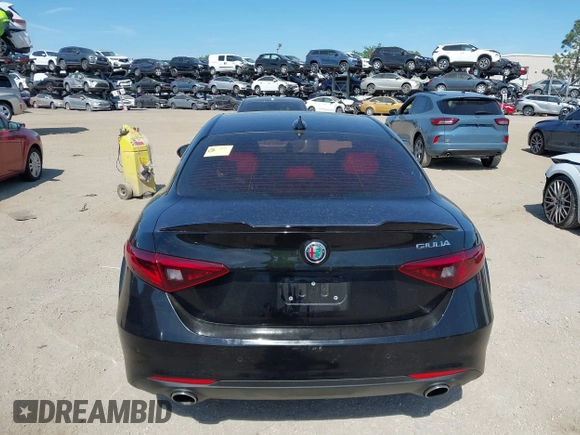 2021 Alfa Romeo Giulia Ti Sport with VIN ZARFAMBN2M7649941, listed as a IAAI auction lot 41912686 with 77,626 mi miles and . Bid and sale history available at DreamBid. Image 16.